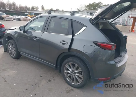 2021 Mazda Cx-5 Grand Touring z USA, uszkodzony, nr VIN JM3KFBDM5M0469257